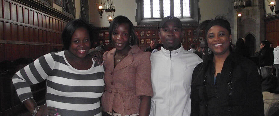 Black women pose for a smile